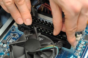 Hands Installing Computer Parts