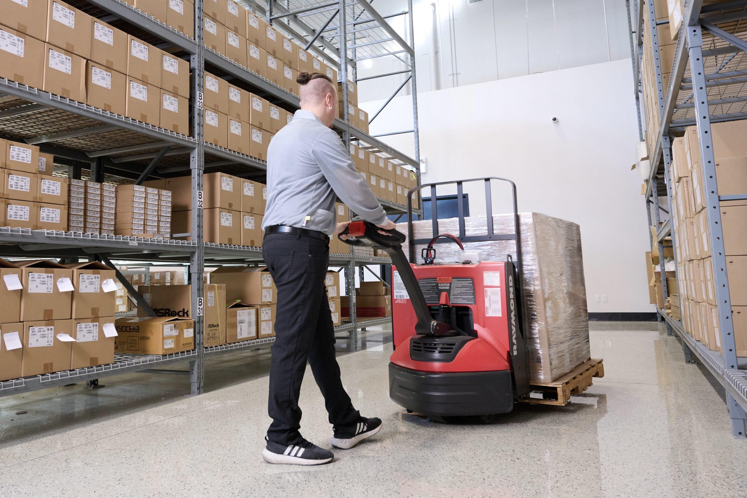 Warehouse Worker in New Ear Electronics Warehouse